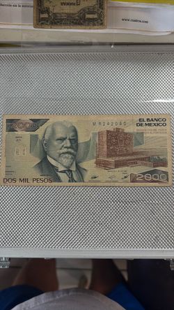 2000 pesos  , justo guerra  president  1(contact info removed)
