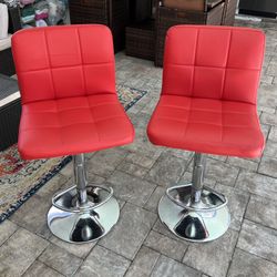 Adjustable Leather Swivel Bar Stools. Gloss Red. Set of 2. I can deliver for an additional cost. In very good condition. 
