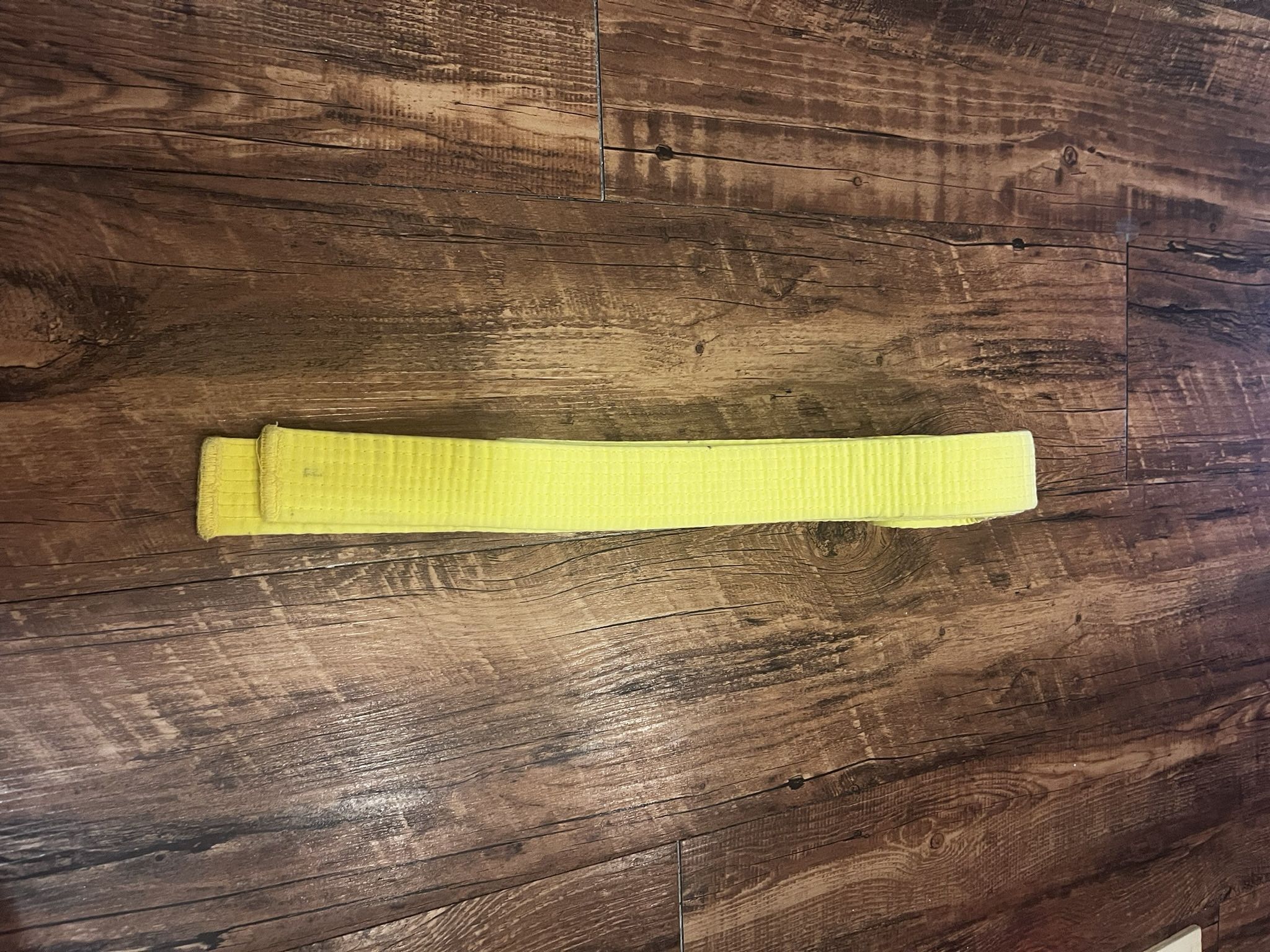 Yellow martial arts belt number 2