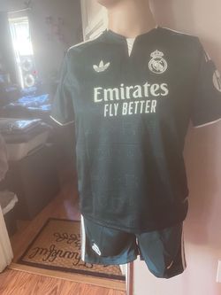 Real Madrid dark green KIDS soccer jerseys size 5 through 12 years old.