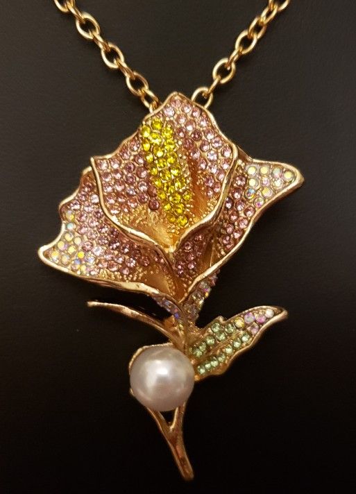 NEW Betsey Johnson Flower Necklace.  Gold with Pink, Yellow, Green, & Clear Iridescent Rhinestones with a Pearl.  Absolutely Beautiful!  Chain is appr