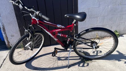 Red Huffy Rock Creek Mountain bike , 26’, Dual suspension