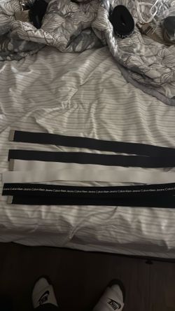 Dark grey and white and Calvin Klein strap for belt