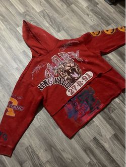 red oversized hoodie with rhinestones