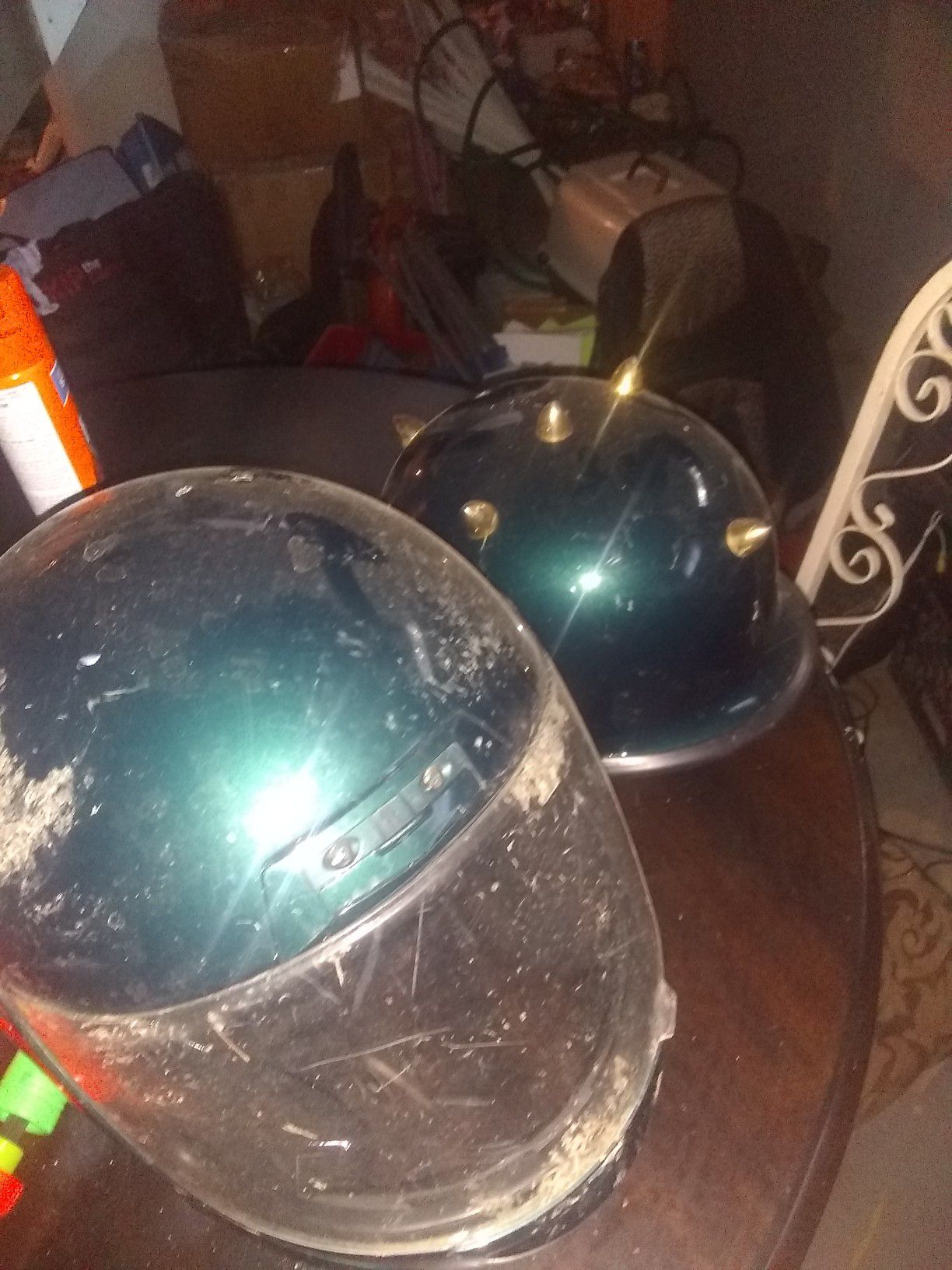 2 used motorcycle helmets