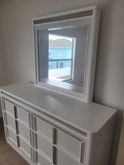 Queen bedframe 2 side tables and dresser with mirror light up.