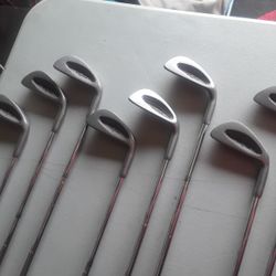 Set Of Golf Clubs...11