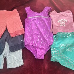 Gymnastics Bundle With 2 Rashguards And A Tutu Skirt For Girls Ages 6-7. Take All For Price Listed. No Lower. Firm On Price 