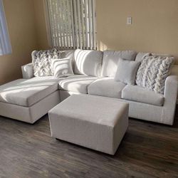 White Greyish Sectional With Free Ottoman 