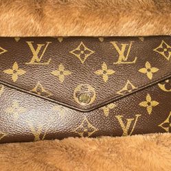 Authentic Louis Vuitton Sarah Wallet