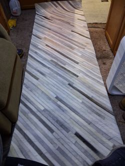 2.6 feet by 8 feet throw rug.