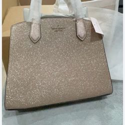 Kate Spade New York Tinsel Satchel, likely in Rose Gold glitter. 