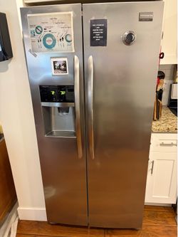 Frigidaire Gallery refrigerator/freezer, dishwasher, microwave, and gas stove