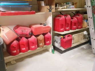 Lot of Red Plastic Gas Cans
