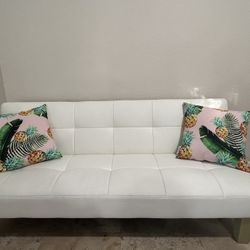 White Faux Leather Futon With Tropical Pillow 