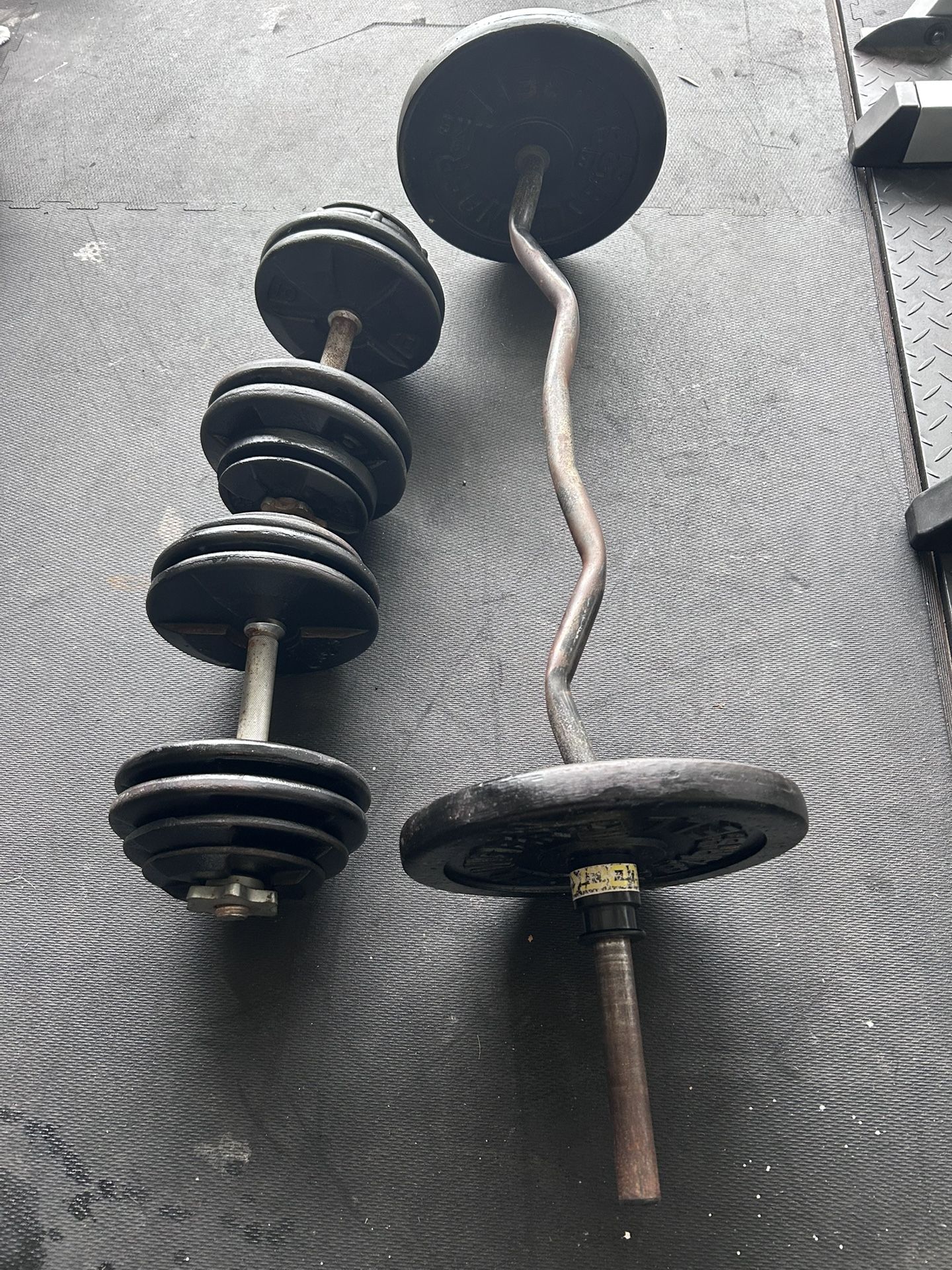 5 - 60 LB Adjustable Dumbbells and curl bar