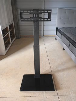 Freestanding universal floor TV stand