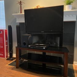 40” TV with stand and sound system