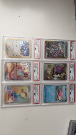 Pokémon graded cards and dragon with one piece