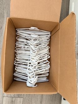 Box of baby/kids clothing hangers - white