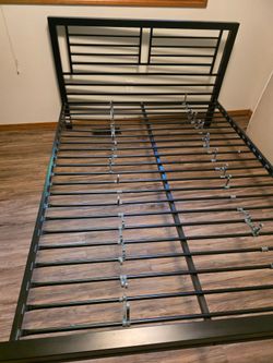 Full size metal bed frame. I have the mattress in box spring as well