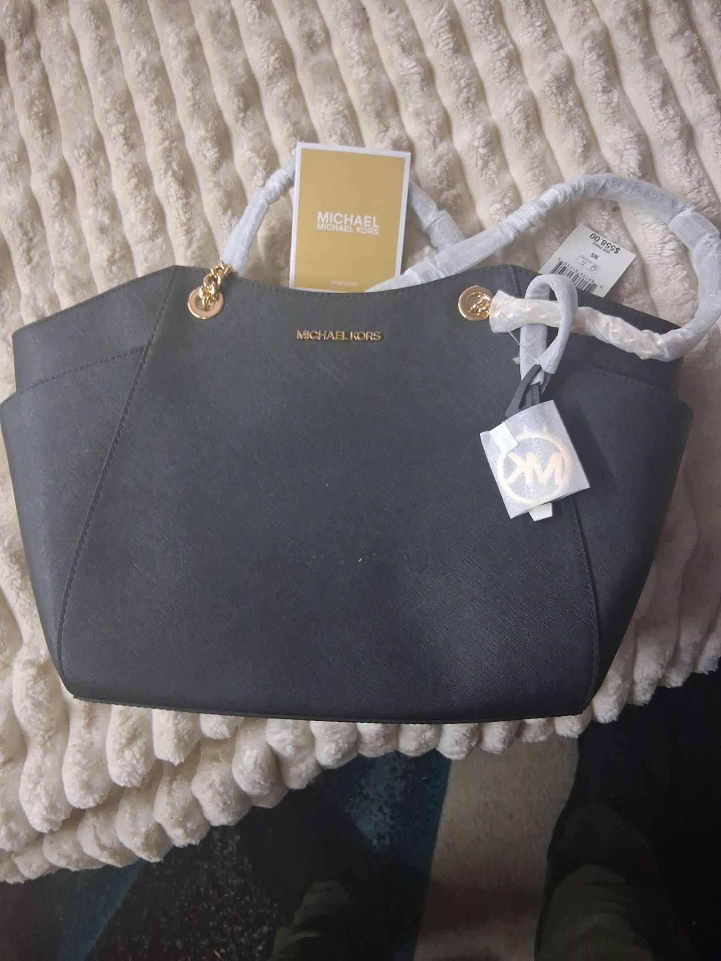 New black Michael kors purse with tags