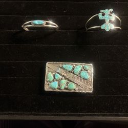 Vintage Native American steleing silver cuffs and belt buckle