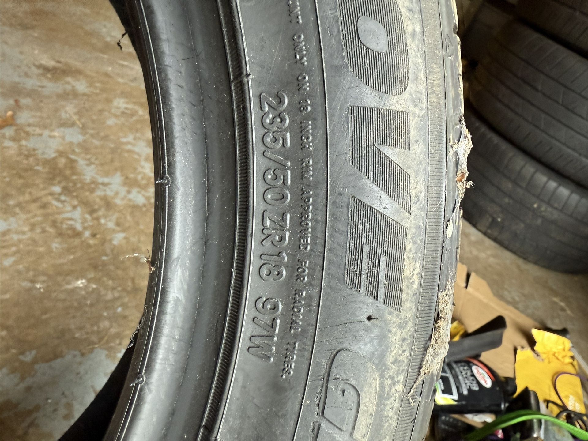 One Tire. 235/50 ZR18 97W