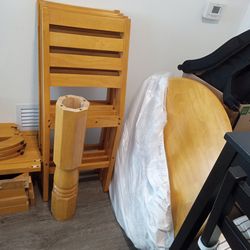 Round wood brand new table with chairs