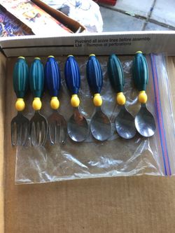 Spoons & forks set for baby's used is missing one fork