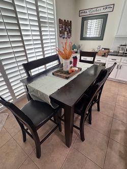 Dark Wood Counter Height Dining table with bench and chairs