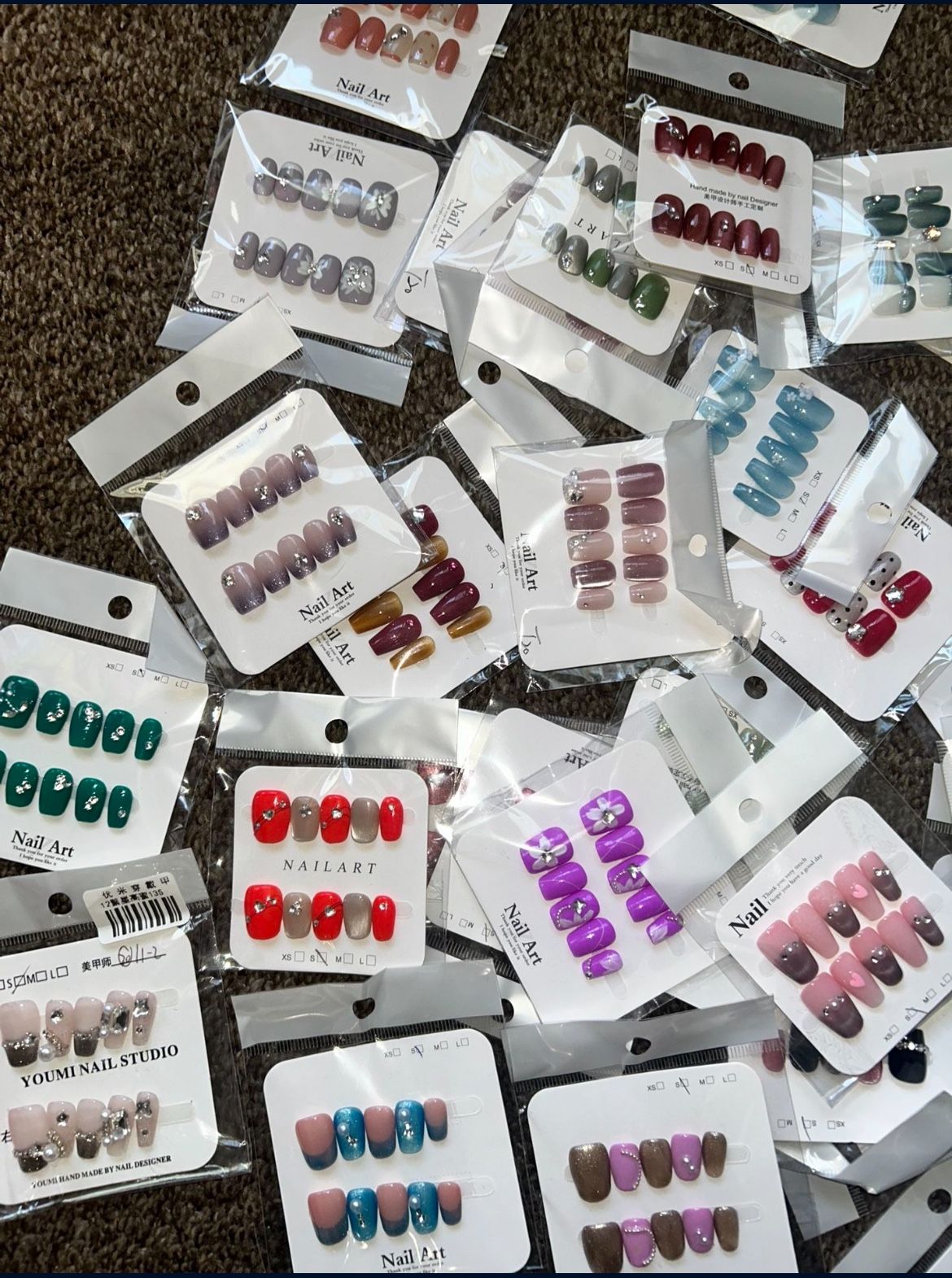 50 Pairs Of Assorted Press On Nails.
