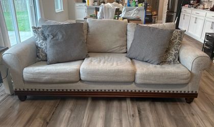 Bob’s Furniture Beige Sofa/Couch with Nailhead Trim – $200 OBO.