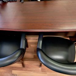 Executive desk and chairs.
