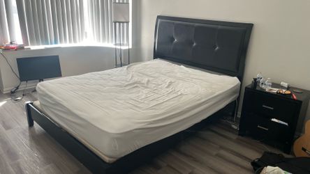Queen size bed with nightstand
