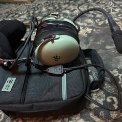 David Clark headset with microphone and carrying case.