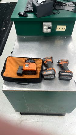2 Cordless Ridgid Drivers 3 Batteries And Charger And Case
