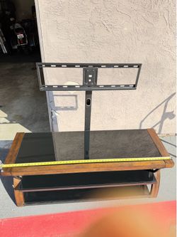 TV Stand glass with mounting bracket in good condition
