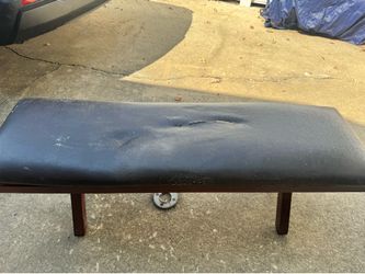 An old vintage leather bench( needs fixing up)