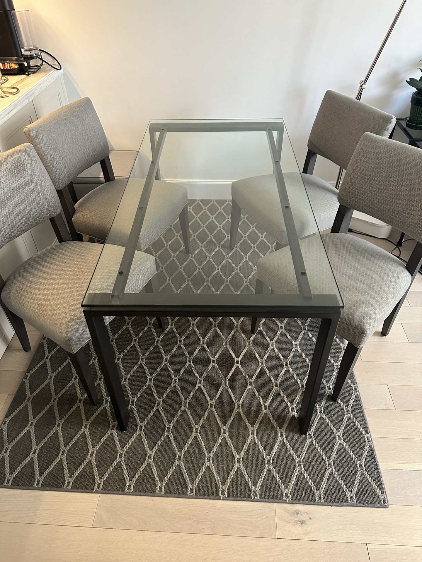Crate & Barrel Glass Dining Table with 4 Chairs – Seats 4–6