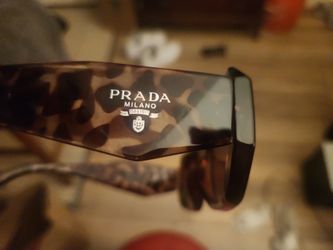 Woman's Prada glasses