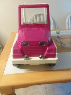 pink & white doll vehicle