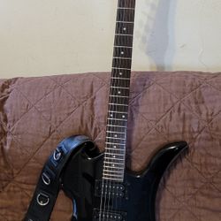BC RICH MOCKINGBIRD BRONZE SERIES ELECTRIC GUITAR MODEL MG ST/WH  MADE IN INDONESIA IN BLACK COLOR. 