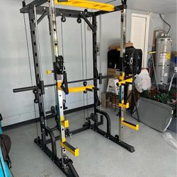 New.  Smith Machine With Cable Crossover-home Gym System includes landmine,  pull-up bar, adjustable pulleys, dip bars, and extra bar ho