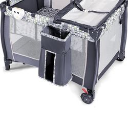 Costzon 3 in 1 Pack and Play with Bassinet, Portable Baby Playard with Changing Table, Bassinet, Music Box, Whirling Toys, Wheels/Brake, Large Basket,