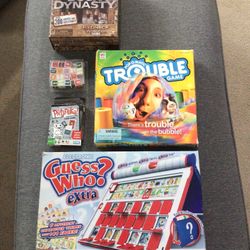 Lot of 4 Board Games Duck Dynasty, Trouble, Pictureka! Card Game, Old Maid Dice Game