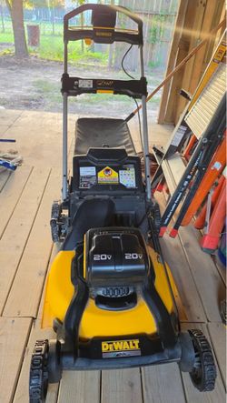 21 in. Dewalt Lawn Mower with batteries.