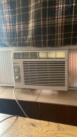 Amazon basics air conditioner with battery powered remote control