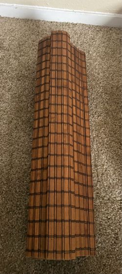 natural woven bamboo roll-up or Roman window blind