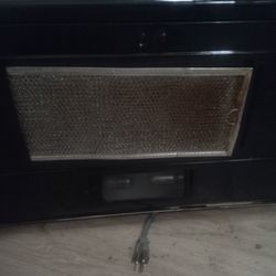 GE  Space Maker  Over stove Microwave 